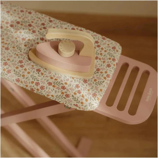 Wooden ironing board with iron