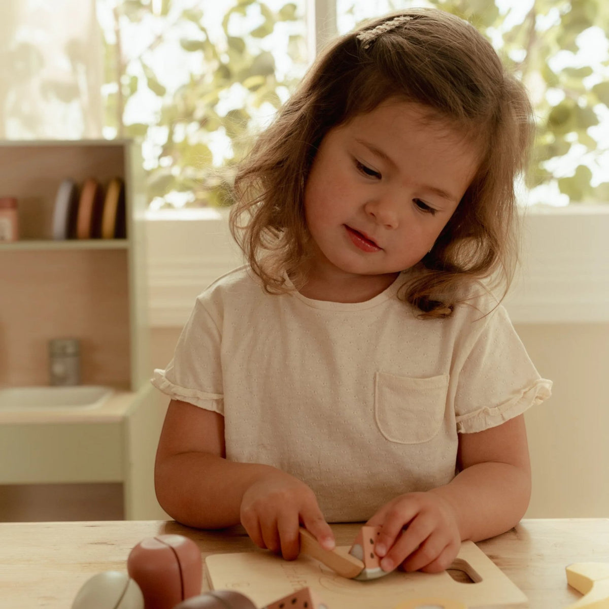 Wooden cutting fruits with board