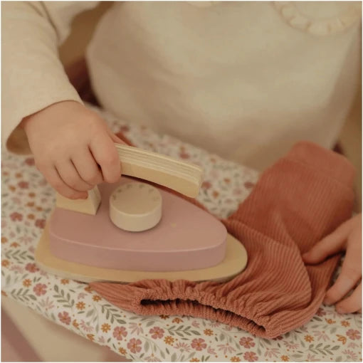 Wooden ironing board with iron