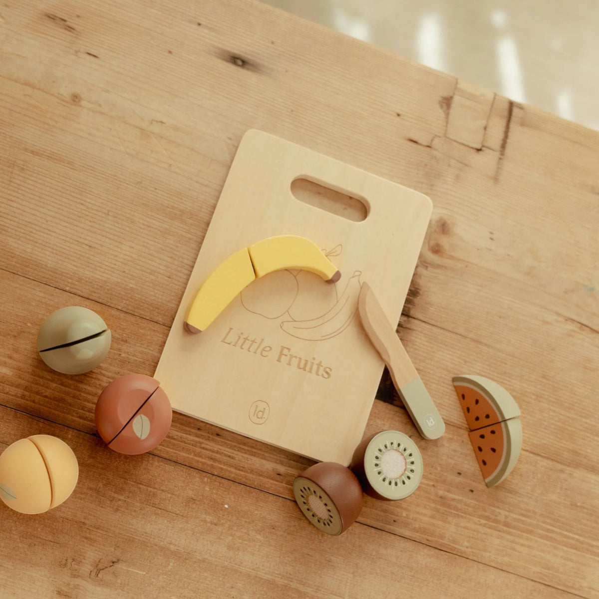 Wooden cutting fruits with board